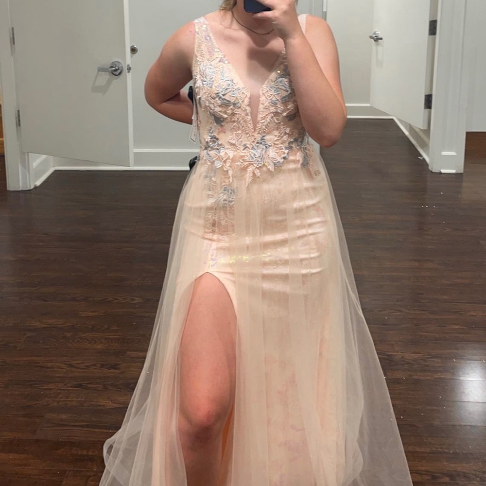 Light ballerina pink prom dress from Camille La Vie.